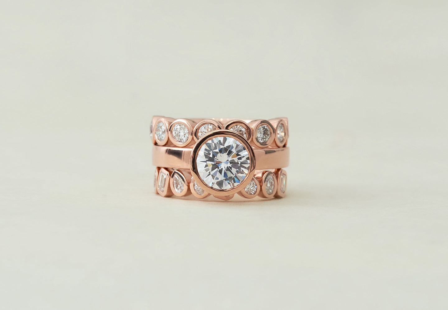 The Frame Eternity, The Square Bezel Solitaire, The Column Mixed Stone rings by Holden in rose gold