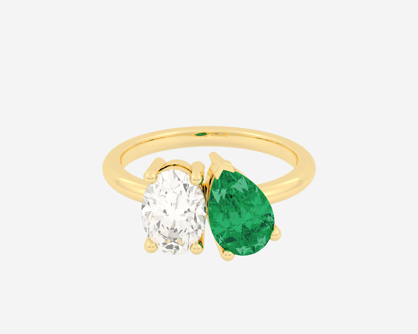 \ alt: Yellow gold toi et moi ring with prong oval and pear-shaped emerald diamond side-by-side \ carat : 1.5 ct