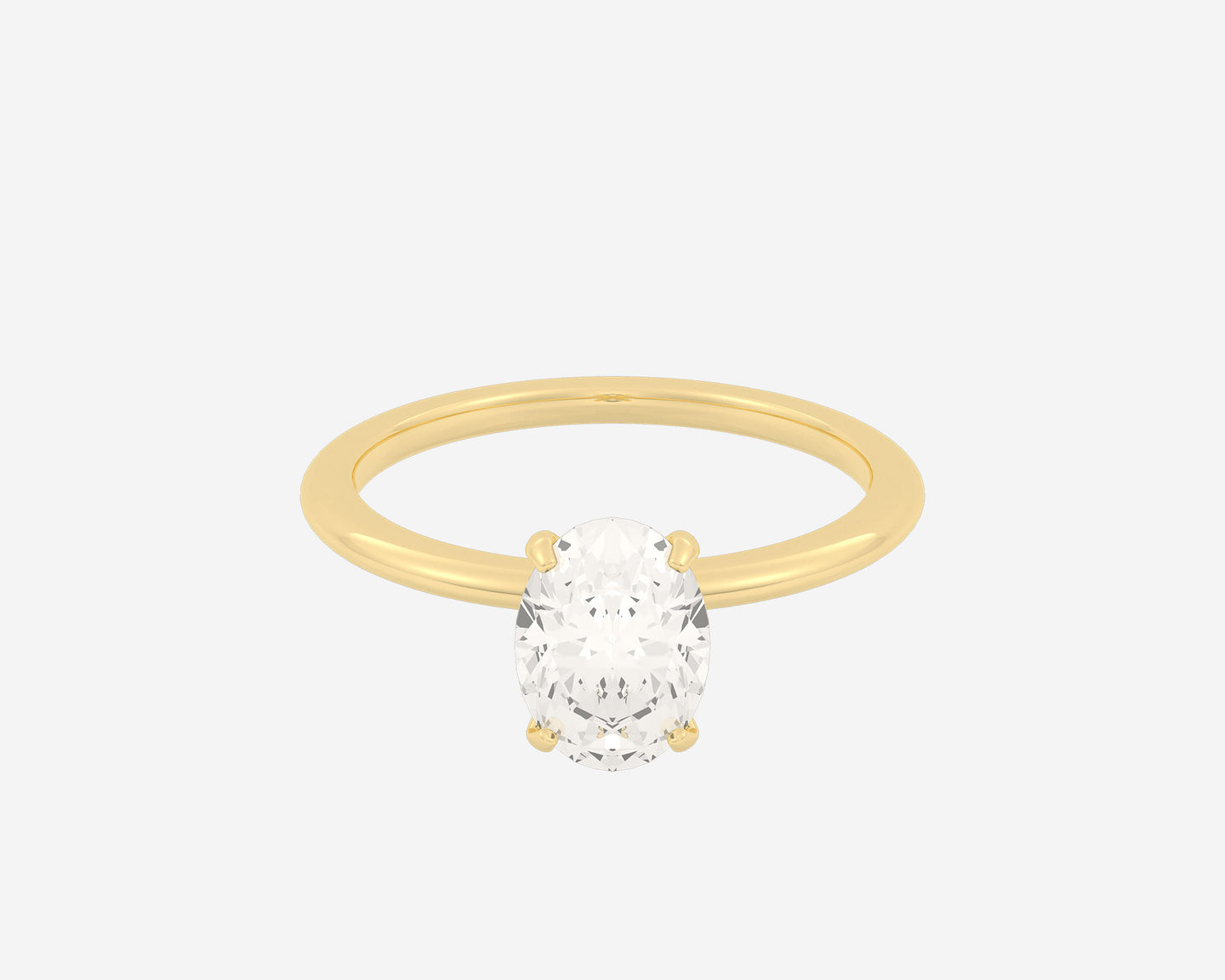 \ alt: Yellow gold solitaire ring with a slim 1.5mm domed band featuring a 1.5ct oval-cut center stone in a timeless setting. \ carat : 1.5 ct